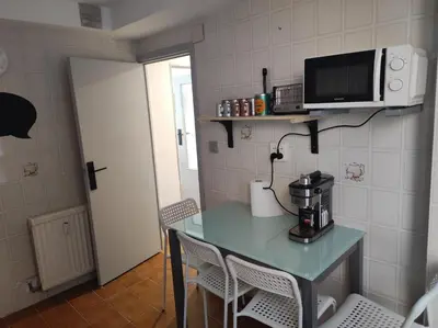 Una cocina o zona de cocina en Apartamento en zona céntrica y tranquila.