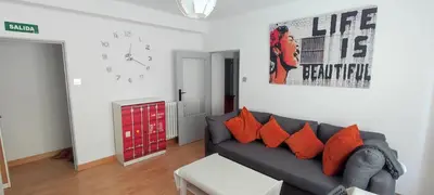 Zona de estar de Apartamento en zona céntrica y tranquila.
