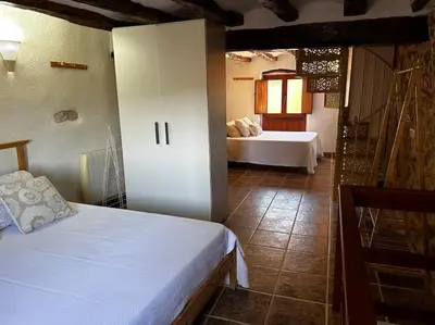 Cama o camas de una habitación en Rural Stone House with wood fireplace