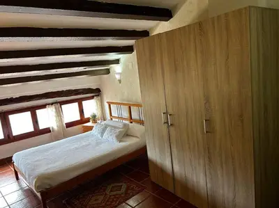 Cama o camas de una habitación en Rural Stone House with wood fireplace