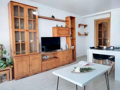 Una televisión o centro de entretenimiento en COBEXO2 Moderno y tranquilo en Sabiñánigo