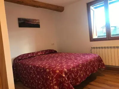 Cama o camas de una habitación en CasaCo Llessui