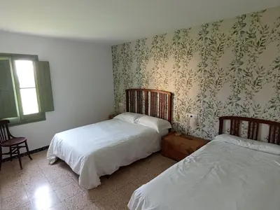 Cama o camas de una habitación en Cal Pigat