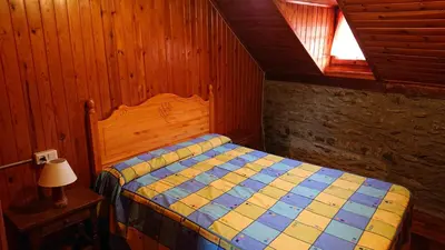 Cama o camas de una habitación en Les Llucanes