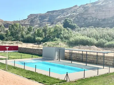 Piscina en o cerca de Precioso Piso Monzón Terraza, PARKING,PISCINA,zona de juegos