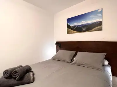 Cama o camas de una habitación en Casa Sinera - L'Amfitriona