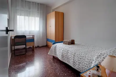 Cama o camas de una habitación en Apartamento turístico Parque Borja