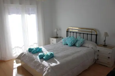 Cama o camas de una habitación en El Refugio