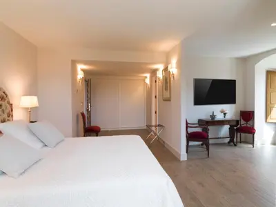 Cama o camas de una habitación en Hospedium Hotel Palacio La Lozana
