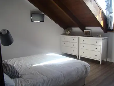 Cama o camas de una habitación en Àtic el Paller de Llau