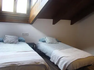 Cama o camas de una habitación en Àtic el Paller de Llau