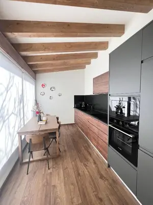Una cocina o zona de cocina en BÁNOVA APARTAMENTO TURÍSTICO