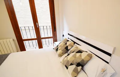 Cama o camas de una habitación en Apartamento Encanto Tarazona Plaza de España