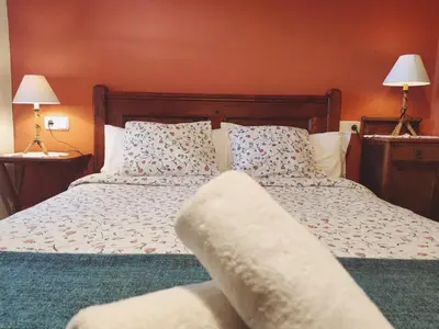 Cama o camas de una habitación en CASA JAN, Casa Rural en Beraní