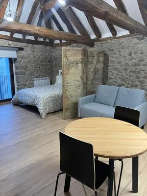 Cama o camas de una habitación en Loft Casa Bergua