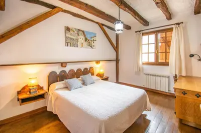 Cama o camas de una habitación en Amplia casa rural en el corazón del valle Ulzama