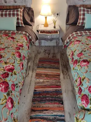 Cama o camas de una habitación en El Racó de la Civaderia, casa en Montblanc