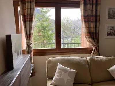 Una televisión o centro de entretenimiento en Apartamento un dormitorio Los Altos de Escarrilla, FORMIGAL-PANTICOSA