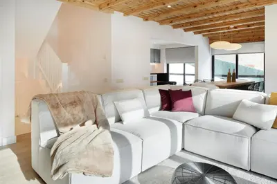Zona de estar de Inuit by FeelFree Rentals