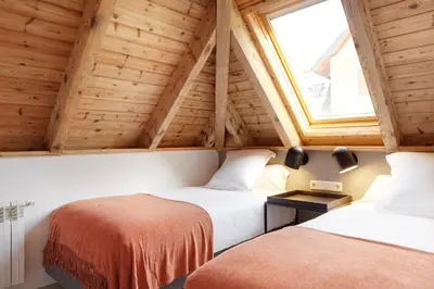 Cama o camas de una habitación en Inuit by FeelFree Rentals