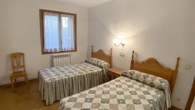 Cama o camas de una habitación en C12 - Apartamento Casa Llorgodo 3 - Villmor