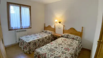 Cama o camas de una habitación en C12 - Apartamento Casa Llorgodo 3 - Villmor
