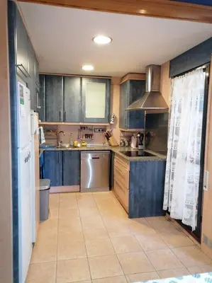Una cocina o zona de cocina en Apartamento para 6 personas en Barbastro