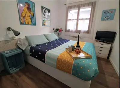 Cama o camas de una habitación en CHECK-IN CASAS La casa de Teresa