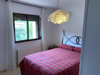 Cama o camas de una habitación en Cal Roig