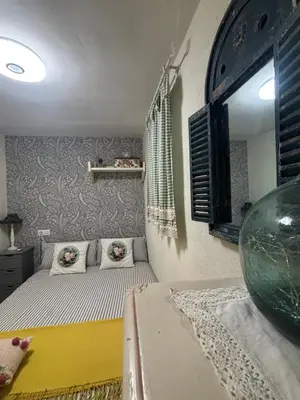 Cama o camas de una habitación en Cueva Colorin Alloza.