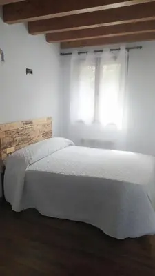 Cama o camas de una habitación en Casa Rural Tejedor
