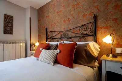 Cama o camas de una habitación en Albergue de peregrinos en CIRAUQUI - CASA MARALOTX Camino de Santiago