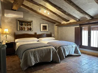 Cama o camas de una habitación en Casa Rural La Cuca