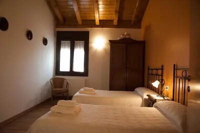 Cama o camas de una habitación en El torreon de la Bruna