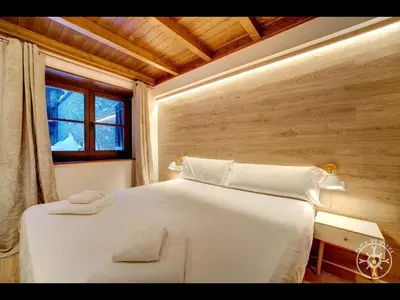 Cama o camas de una habitación en ARGULLS de Alma de Nieve