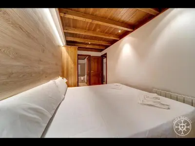 Cama o camas de una habitación en ARGULLS de Alma de Nieve