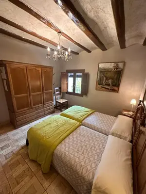 Cama o camas de una habitación en Casa Rural La Tahona
