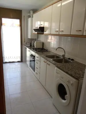 Una cocina o zona de cocina en APARTAMENTS CASA NANDO