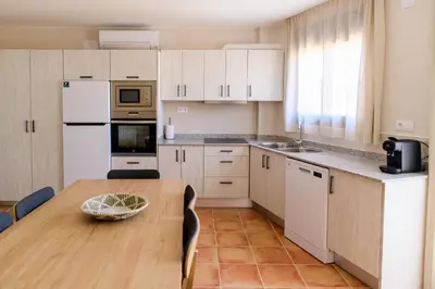 Una cocina o zona de cocina en Ca l'Apotecari