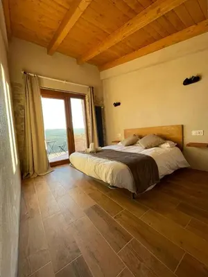 Cama o camas de una habitación en Cal Bertran