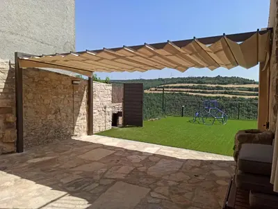 Jardín al aire libre en Cal Bertran