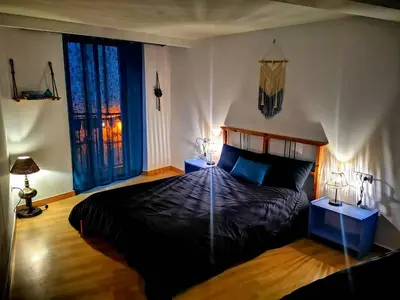 Cama o camas de una habitación en Cornukarma Apartamiento La Capella