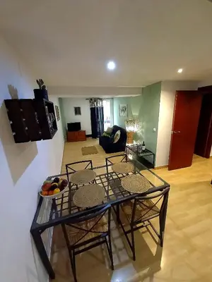 Zona de estar de Cornukarma Apartamiento La Capella