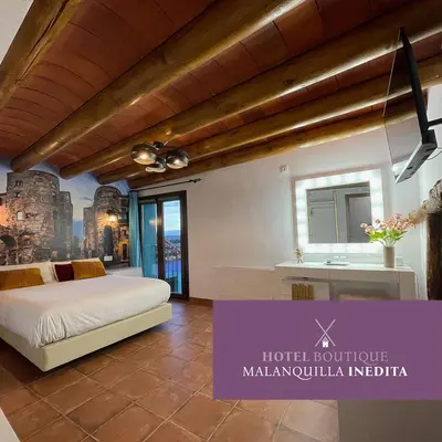 Cama o camas de una habitación en Hotel Boutique Malanquilla Inedita
