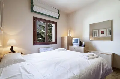 Cama o camas de una habitación en Luderna - Apartamento Tanau A2 Esquirós 2