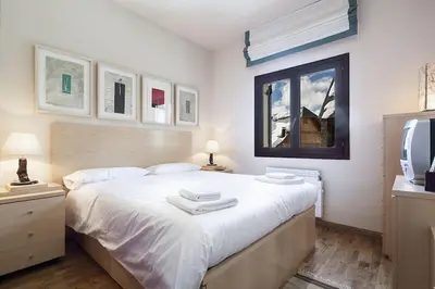 Cama o camas de una habitación en Luderna - Apartamento Tanau A2 Esquirós 2