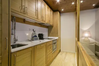 Una cocina o zona de cocina en Luderna - Apartamento Val de Ruda A19 de Saumet