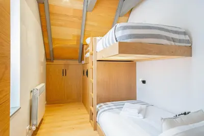 Cama o camas de una habitación en Luderna - Casa Carboneu