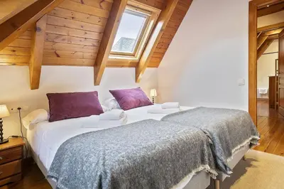 Cama o camas de una habitación en Luderna - Dúplex Gessa C11