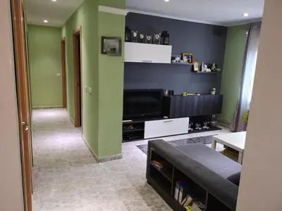 Una televisión o centro de entretenimiento en Apartamento Duartes en Barbastro vistas al pirineo